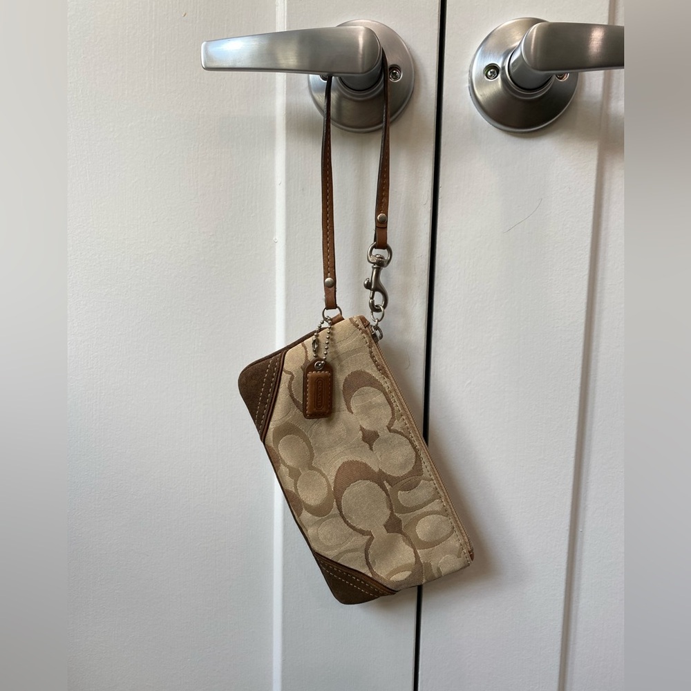 Coach signature canvas and leather wristlet clutch